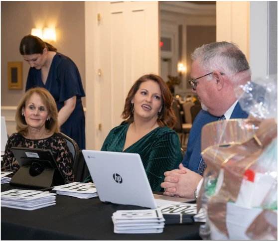 Volunteers helping at Gala Fundraiser event