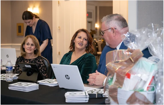 Volunteers helping at Gala Fundraiser event